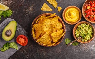 Tortilla chips with avocado and cheese